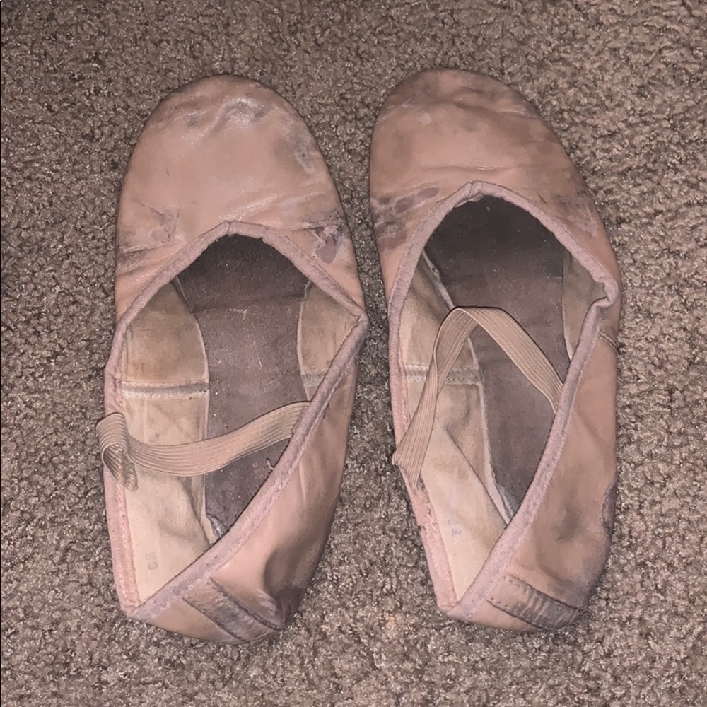 Very worn ballet shoes